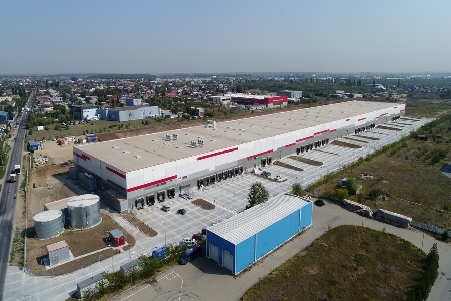 Cum influenţează creșterea preţurilor materialelor de construcţii piaţa spaţiilor logistice și industriale?
